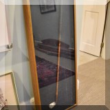 D11. Framed antique golf club. 